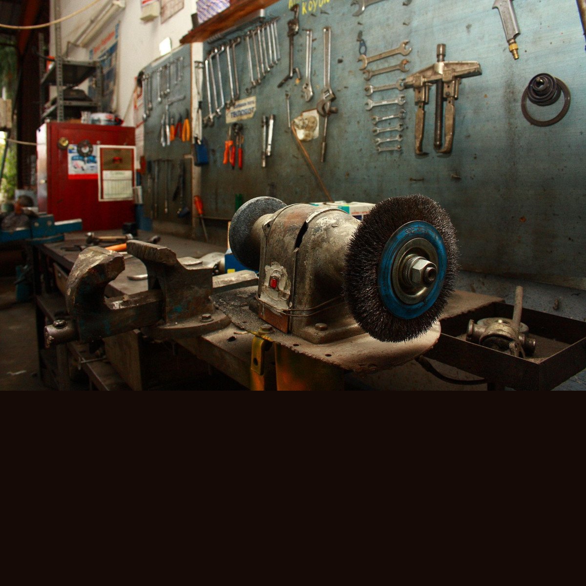 Workshop bench filled with tools and machinery - hand tools and accessories at TMM Trades